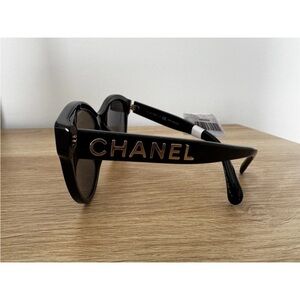 NWOT CHANEL Black and Gold Sunglasses